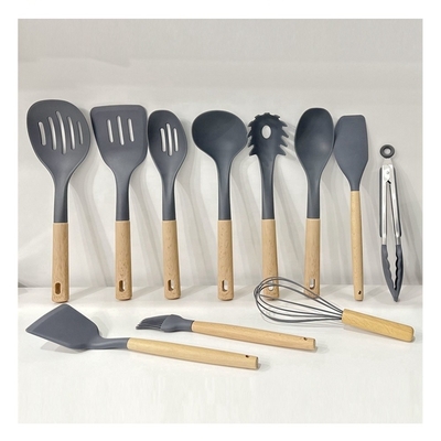 Conjunto de utensilios de 7 piezas con mango de madera y agujero colgante Resistente al calor hasta 240 ° C