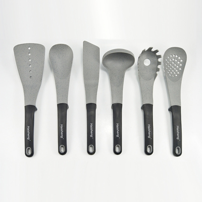 Conjunto de utensilios de cocina no adhesivo con soporte de 7 piezas y resistente al calor hasta 480 ° F
