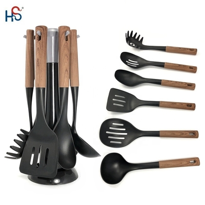 2024 Mejor vendedor mango de madera Silicona utensilios de cocina conjunto con material Nylon66