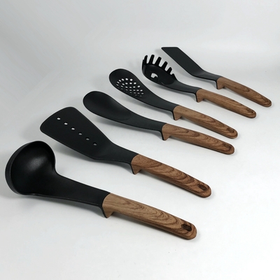 Accesorios de cocina utensilios de cocina no tóxicos personalizados con herramientas de mango ABS negras
