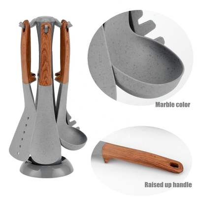Conjunto de utensilios de cocina antiadherentes certificados ISO9001 con mango de acabado de madera y utensilios de cocina